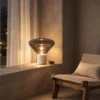 Silas table lamp illuminating a modern interior
