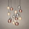 Siris chandelier with cascading rounded glass pendants