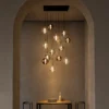 Siris rectangular chandelier illuminating a contemporary dining interior