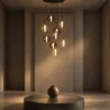 Siris round chandelier with cascading glass pendants in a modern interior