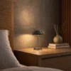 Soren table lamp on a bedside table in a contemporary bedroom