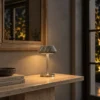 Soren table lamp providing warm illumination in a modern interior