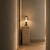 Stellar table lamp providing warm ambient light in a modern interior