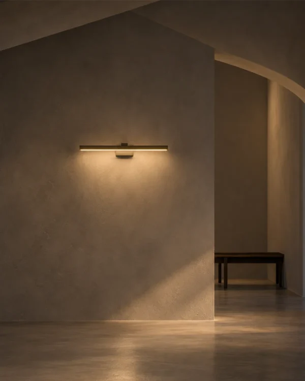 Suvi linear wall lamp illuminating a modern interior