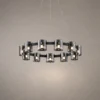 Svein modern circular chandelier with geometric black and smoky glass light holders