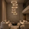 Tianna chandelier with layered circular rings in a contemporary living room