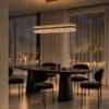 Tianna Rectangular Chandelier Dining Interior Tianna Rectangular Chandelier suspended above a contemporary dining table