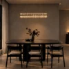 Tianna Rectangular Chandelier Modern Dining Interior Tianna Rectangular Chandelier in Rose Gold displayed in a modern dining interior